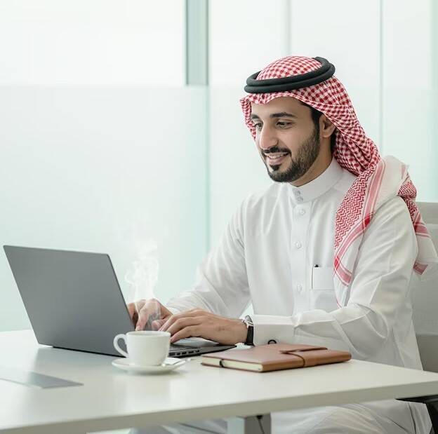 Arab businessman exploring app development solutions in Qatar