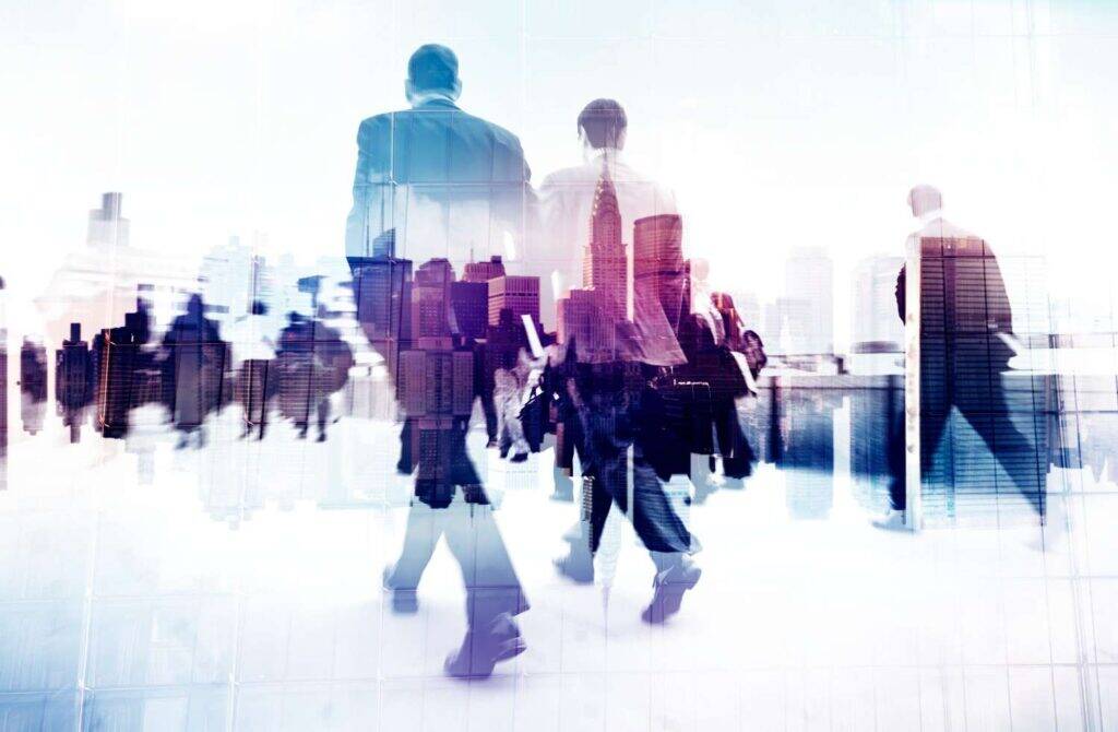 blurred-scene-people-moving-past-offshore-software-development-company-switzerland