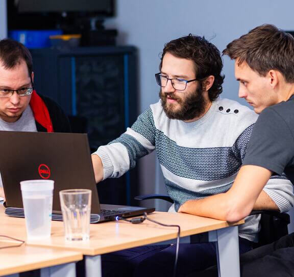 Team discussing project for Software Development Services Atlanta