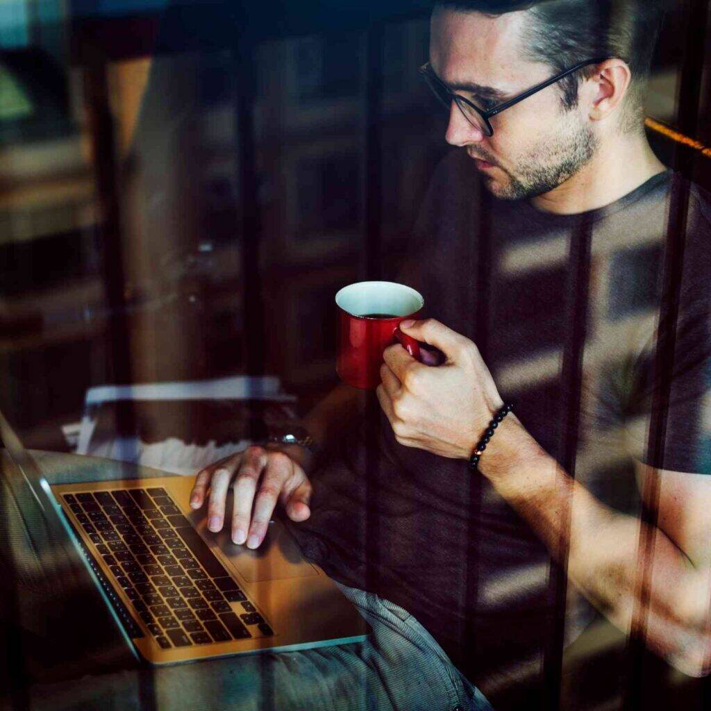 airtable-professional-working-on-a-laptop-building-database-workflows